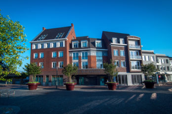 Apartment complex and shops in Best